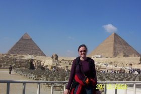 standing at the egyptian pyramids at Giza plus the sphinx